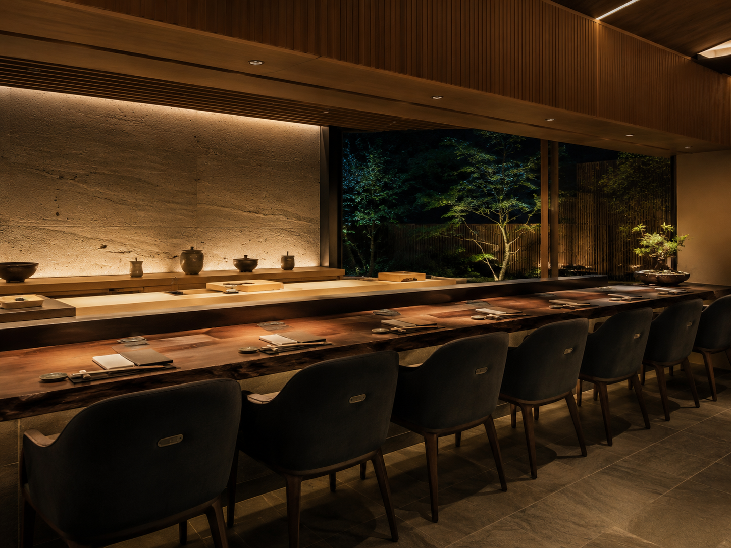 Concept section showing a dark interior with warm off-white text and a gold accent line